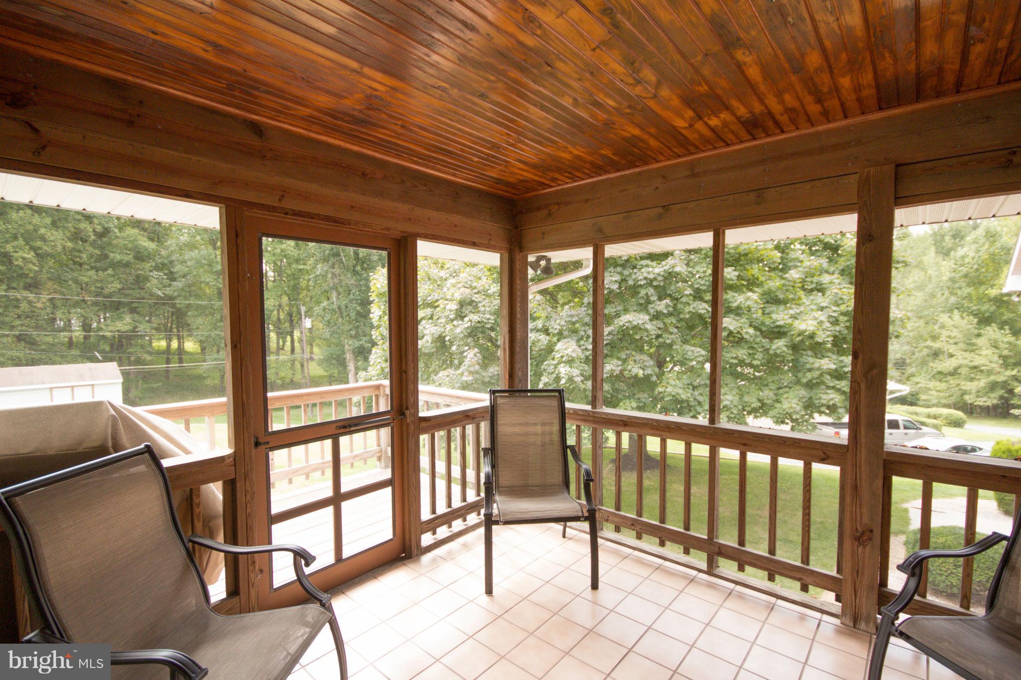 5302 Wendy Road Sykesville, MD 21784 - Photo 12 of 30 Screened porch off kitchen/sunroom