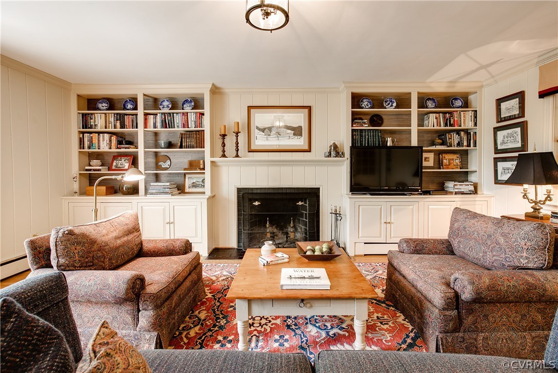 8902 Tolman Road Henrico, VA 23229 - Photo 24 of 50 Wall of built-ins with fireplace