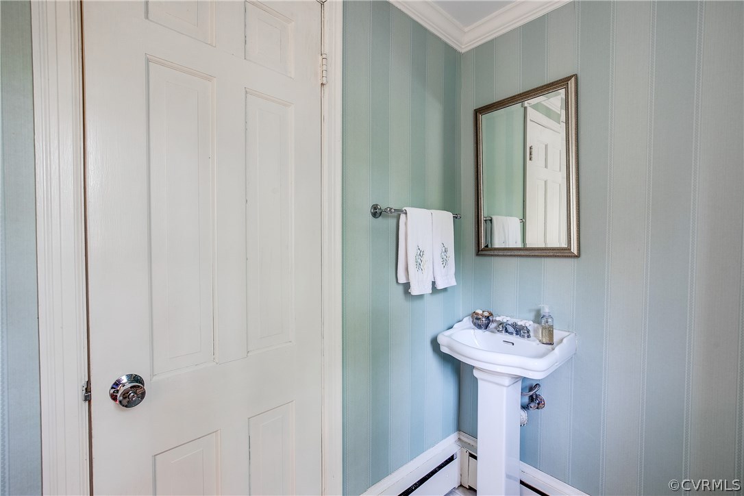 8902 Tolman Road Henrico, VA 23229 - Photo 27 of 50 Powder room is just off the foyer