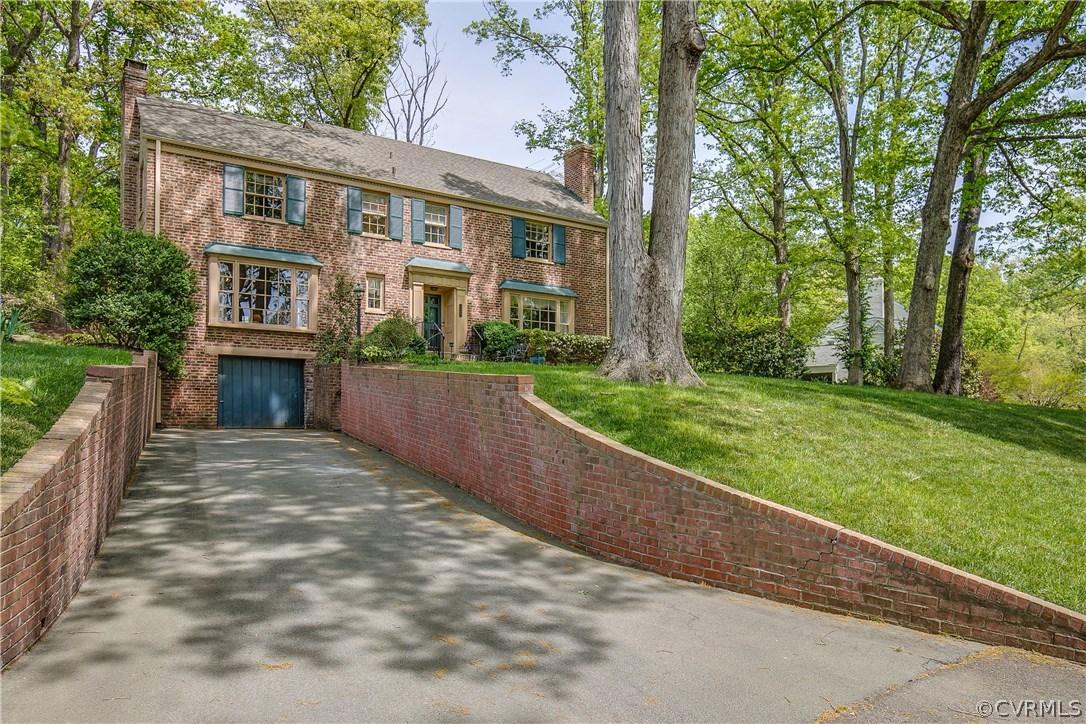 8902 Tolman Road Henrico, VA 23229 - Photo 49 of 50 Driveway and lower level storage