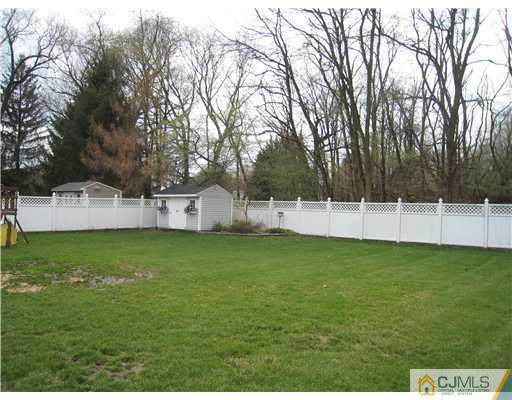 7 Butler Road Edison, NJ 08820 - Photo 16 of 18 a view of a house with a yard