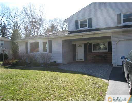 7 Butler Road Edison, NJ 08820 - Photo 18 of 18 a view of a house with a yard