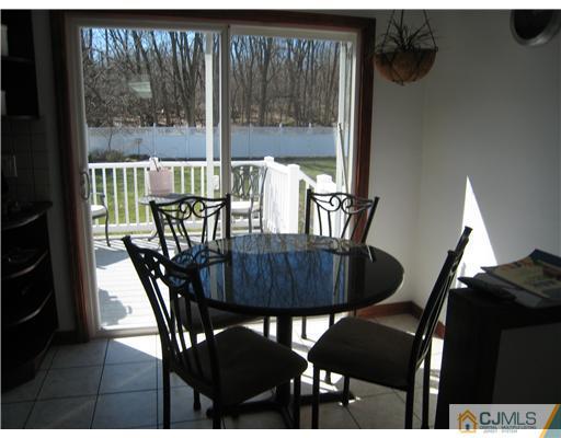 7 Butler Road Edison, NJ 08820 - Photo 5 of 18 a view of a dining room with furniture window and outside view