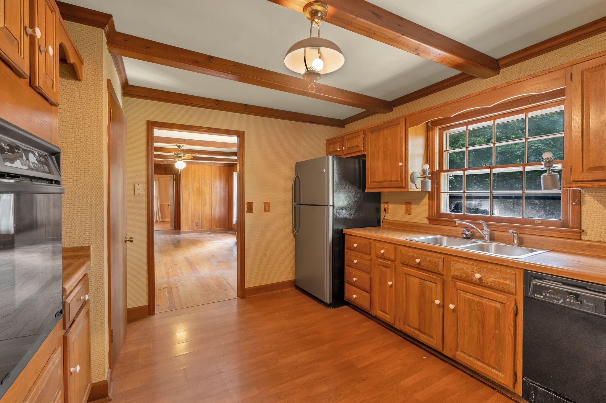 3406 Old Franklin Road Antioch, TN 37013 - Photo 14 of 50 a kitchen with stainless steel appliances granite countertop a refrigerator and a sink
