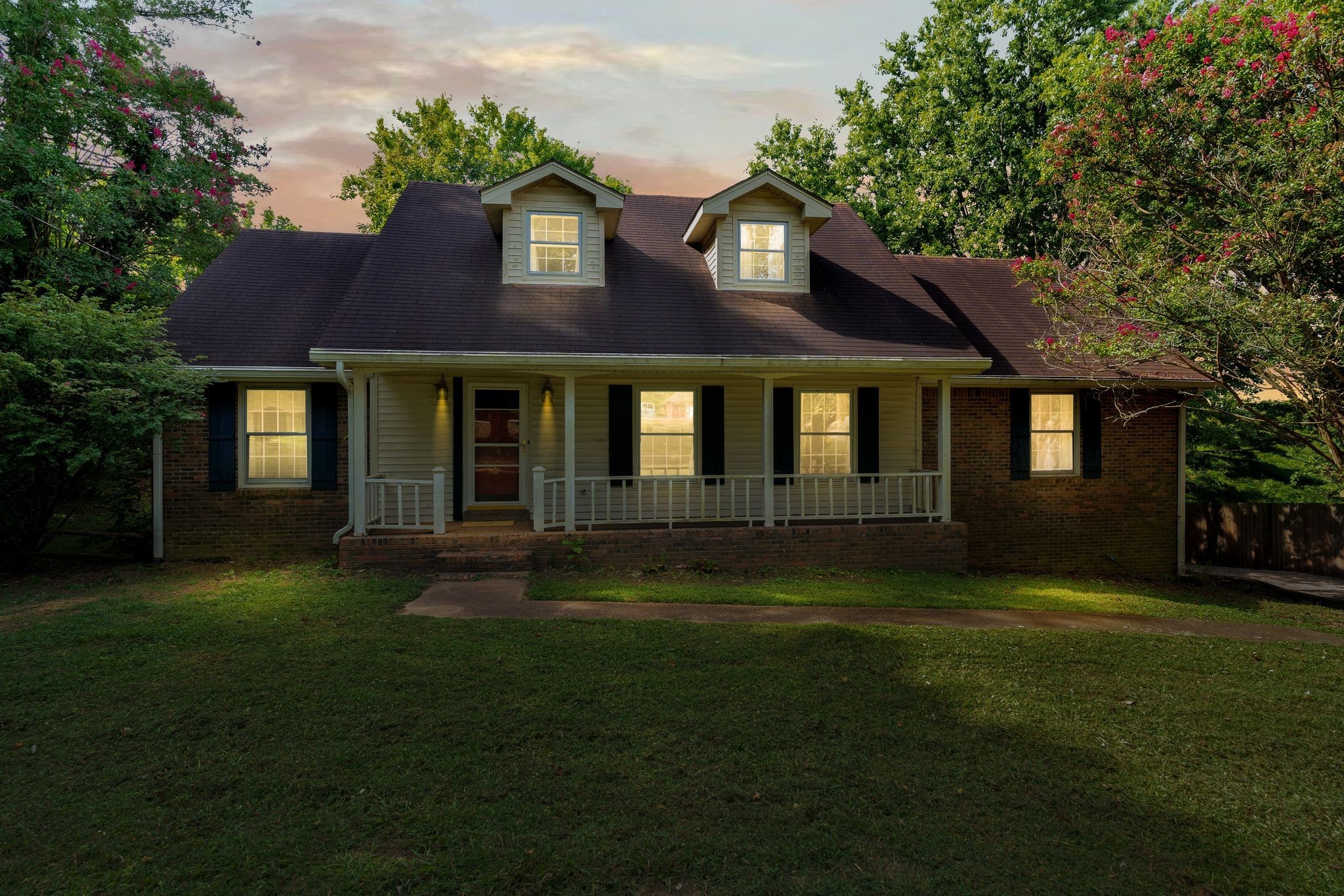 3406 Old Franklin Road Antioch, TN 37013 - Photo 3 of 50 a front view of a house with a garden