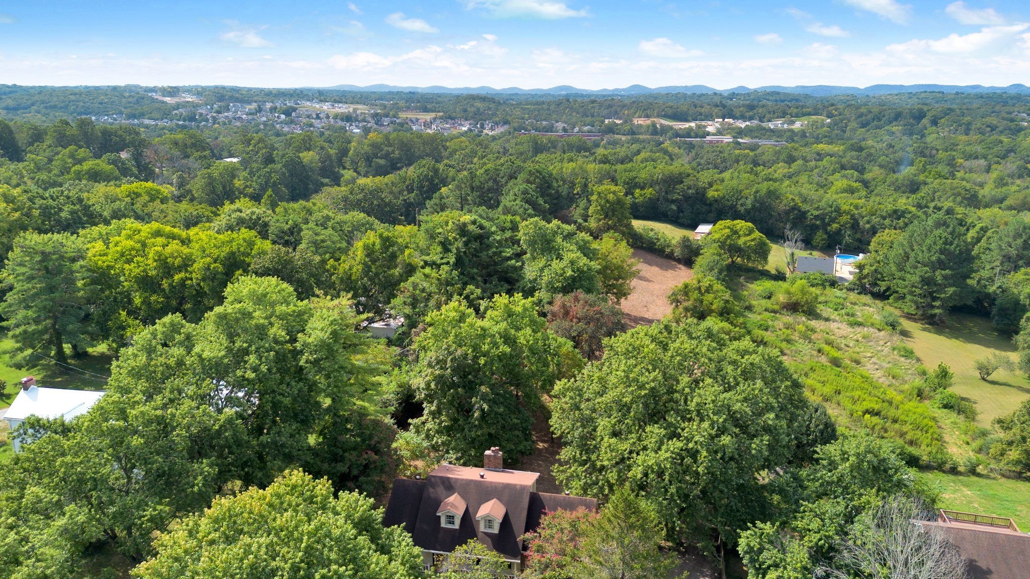 3406 Old Franklin Road Antioch, TN 37013 - Photo 34 of 50 a view of a city with lush green forest