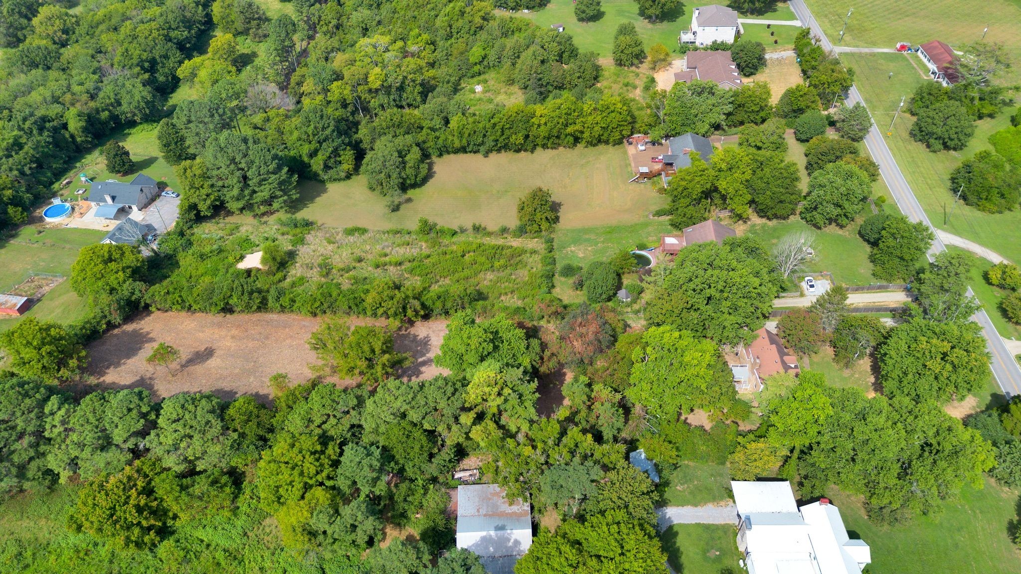 3406 Old Franklin Road Antioch, TN 37013 - Photo 46 of 49 an aerial view of a house with a yard and lake view