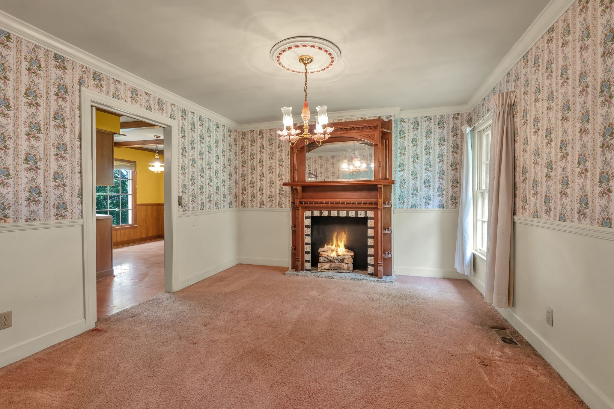 3406 Old Franklin Road Antioch, TN 37013 - Photo 7 of 50 a view of an empty room with a fireplace and a window