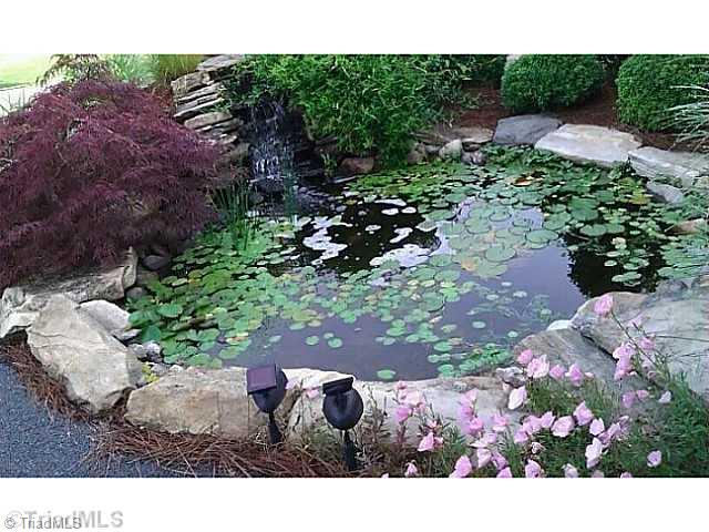 1060 Hill Road King, NC 27021 - Photo 9 of 11 Formal Gardens. Landscape pond with running water!