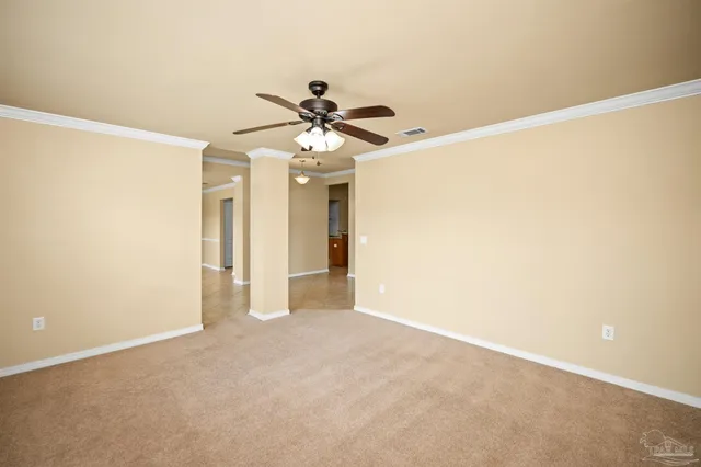 a view of livingroom with hardwood floor and a ceiling fan
