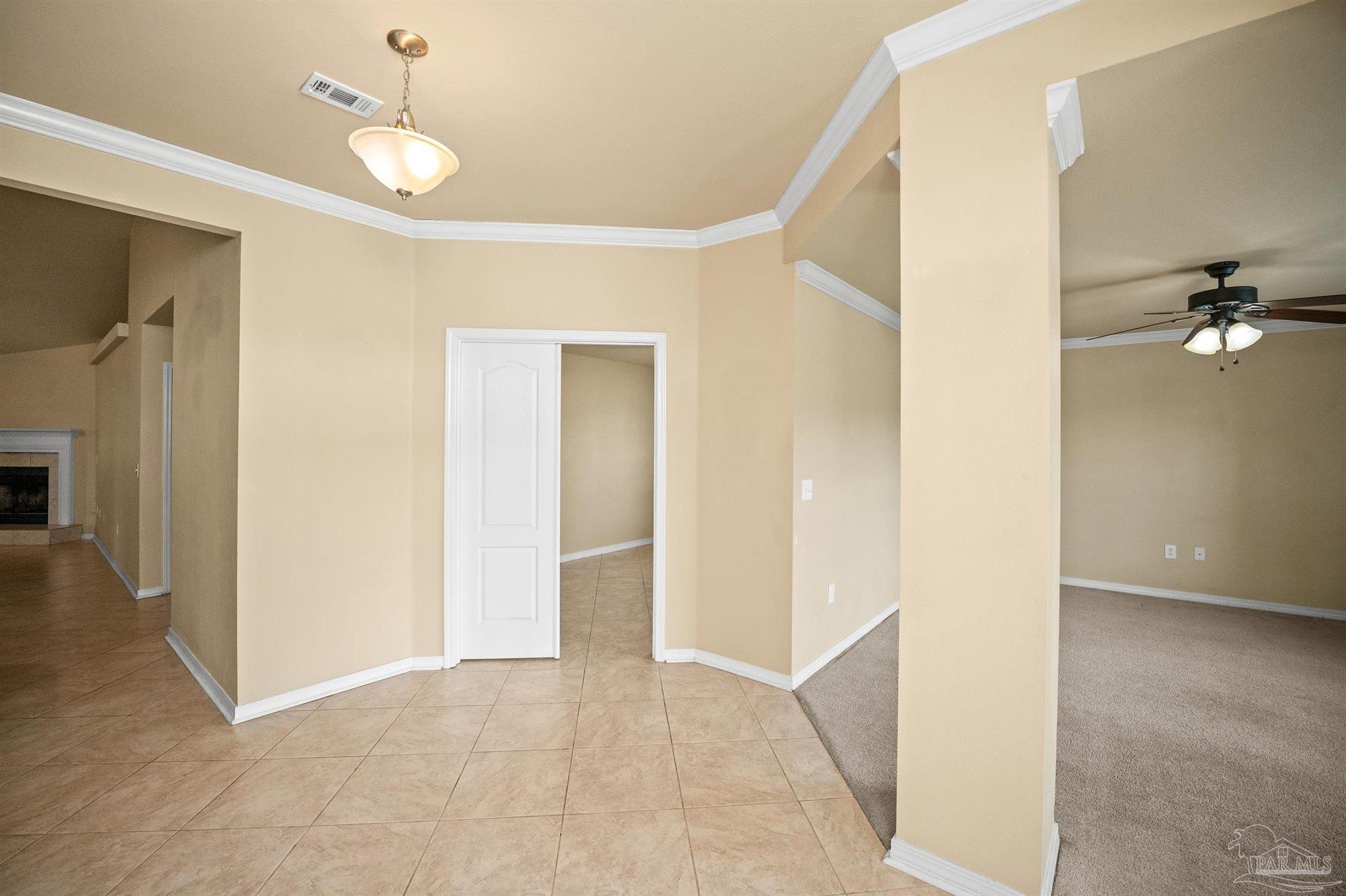 4574 Belvedere Circle Pace, FL 32571 - Photo 20 of 59 a view of livingroom with hardwood floor and a ceiling fan