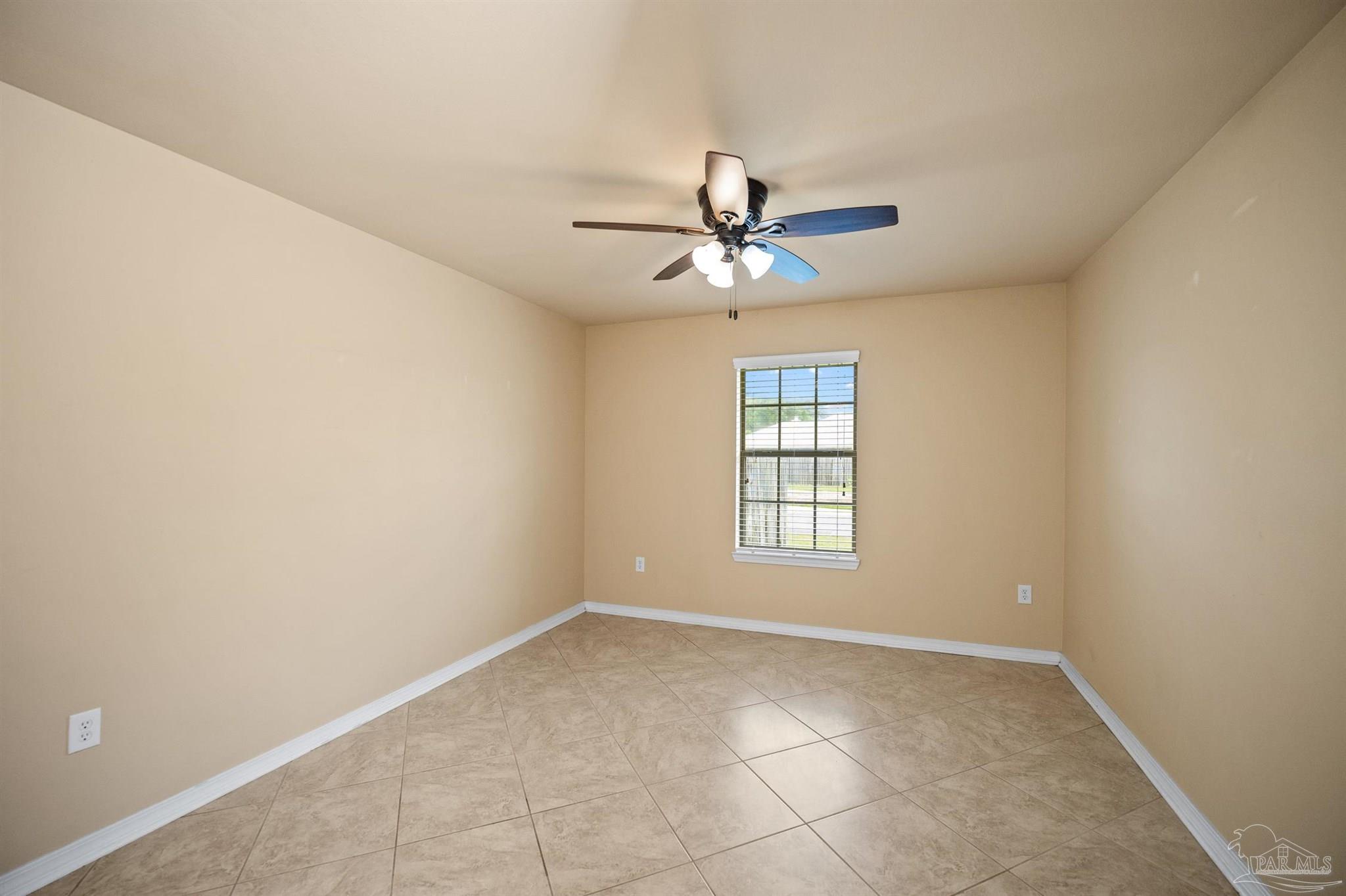 4574 Belvedere Circle Pace, FL 32571 - Photo 21 of 59 a view of an empty room with a window