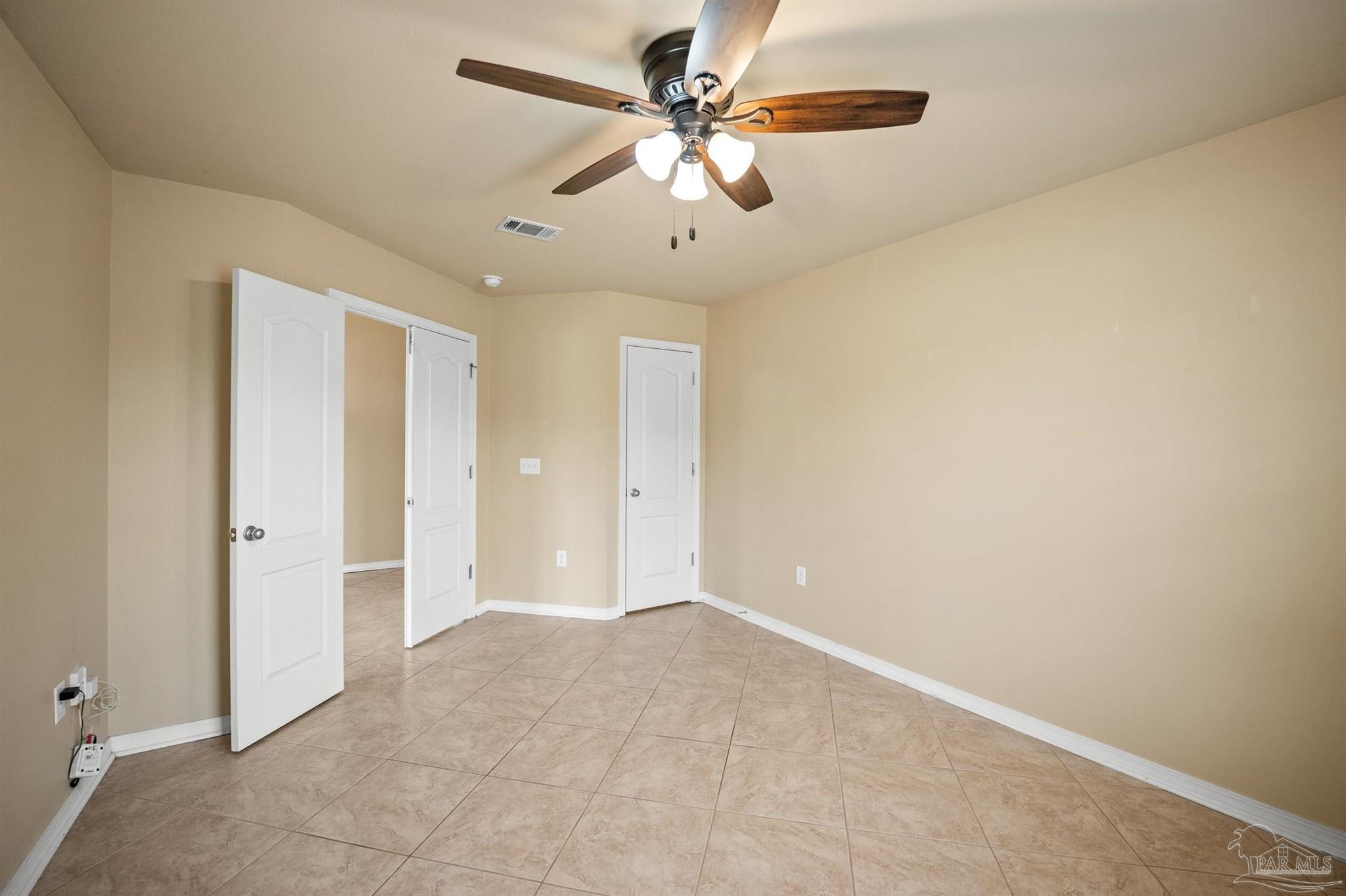 4574 Belvedere Circle Pace, FL 32571 - Photo 22 of 59 wooden floor in an empty room