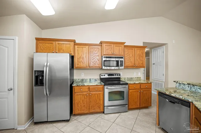 a bathroom with a sink double vanity and a mirror