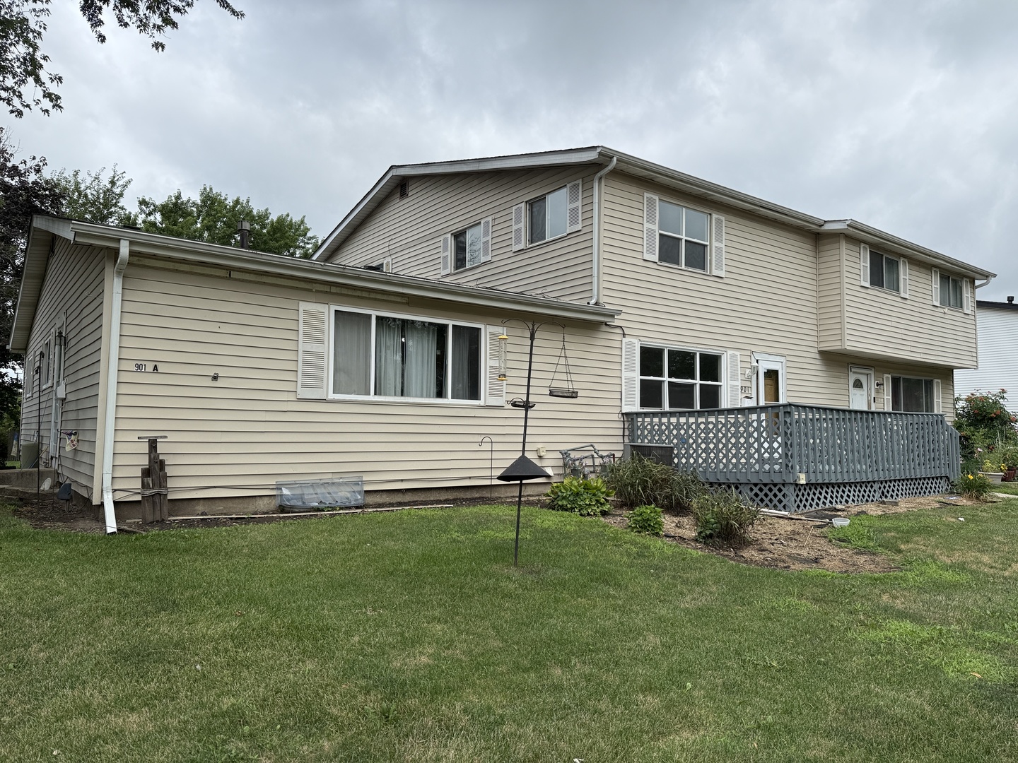901 Gael Drive, Unit B Joliet, IL 60435 - Photo 1 of 17 a view of a house with a yard