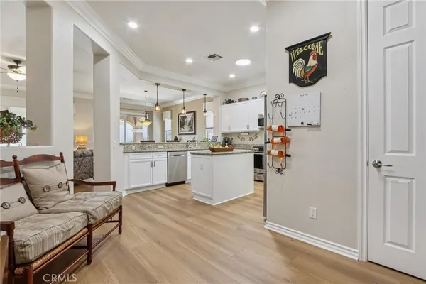a kitchen with stainless steel appliances granite countertop a sink and cabinets