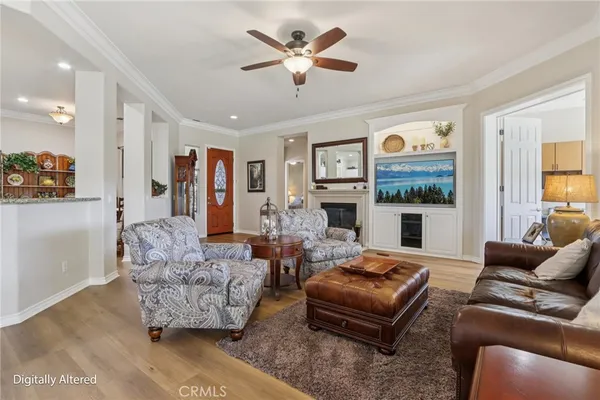 a view of a room with wooden floor