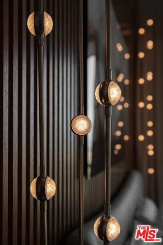 a view of a room with a table and chairs