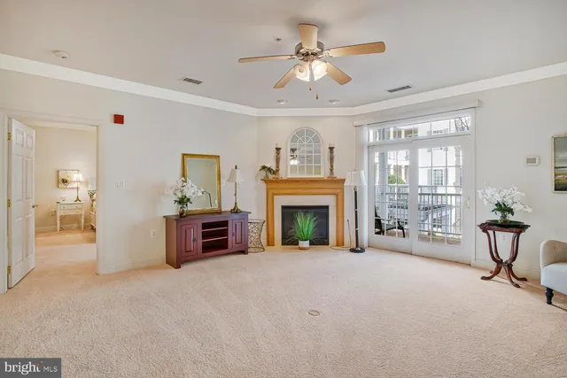 a view of a livingroom with furniture and a fireplace