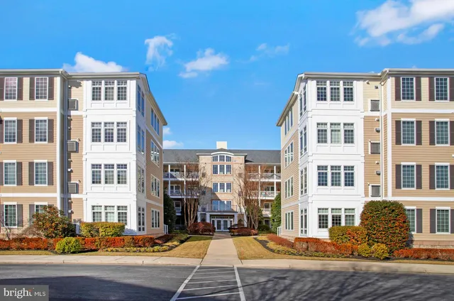 a front view of a building with street view