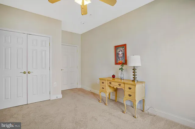 a workspace with furniture and a window