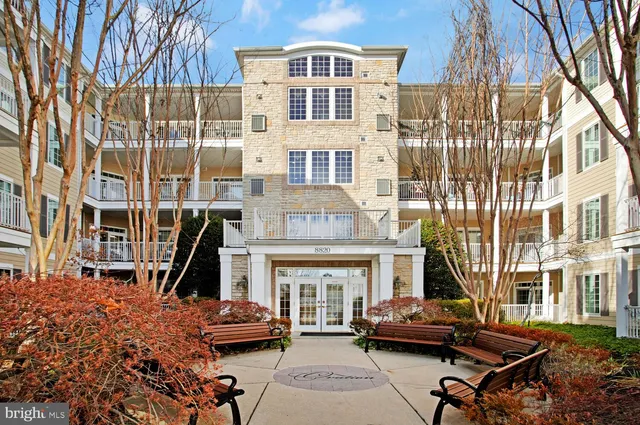 a front view of a building with glass windows
