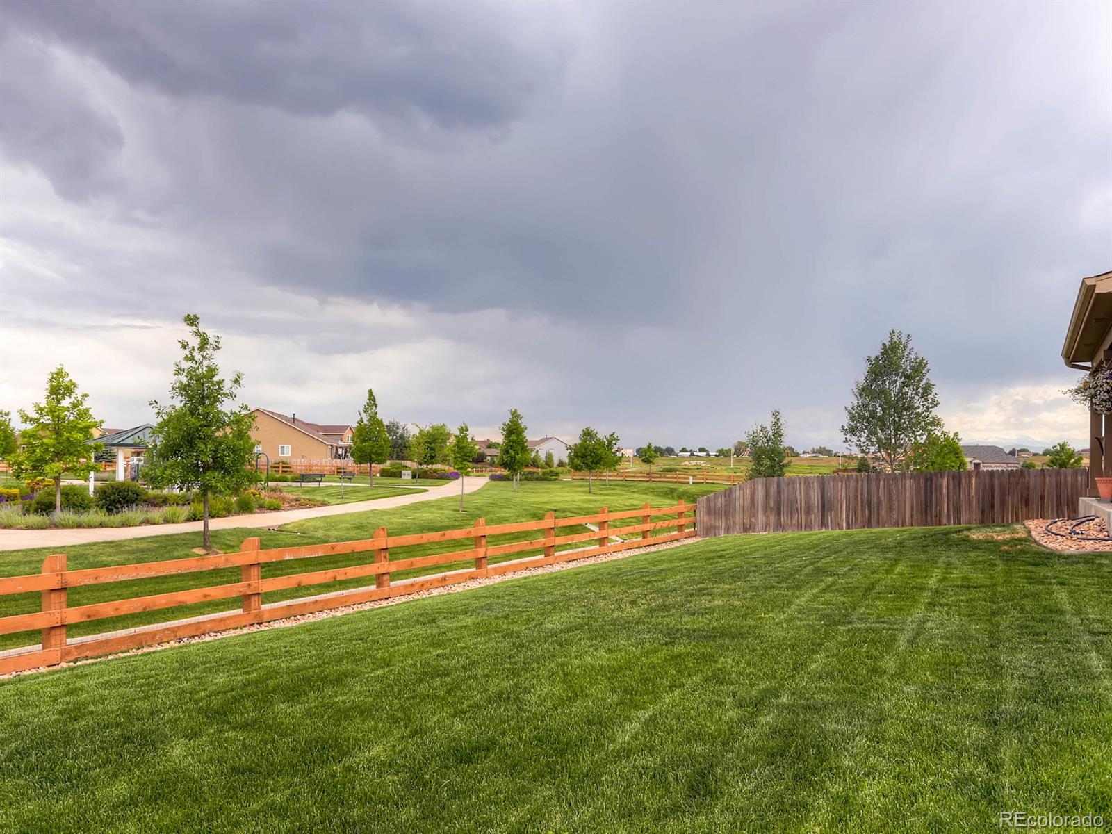 4500 Bramble Road Frederick, CO 80504 - Photo 23 of 25 a view of a golf course with a lake