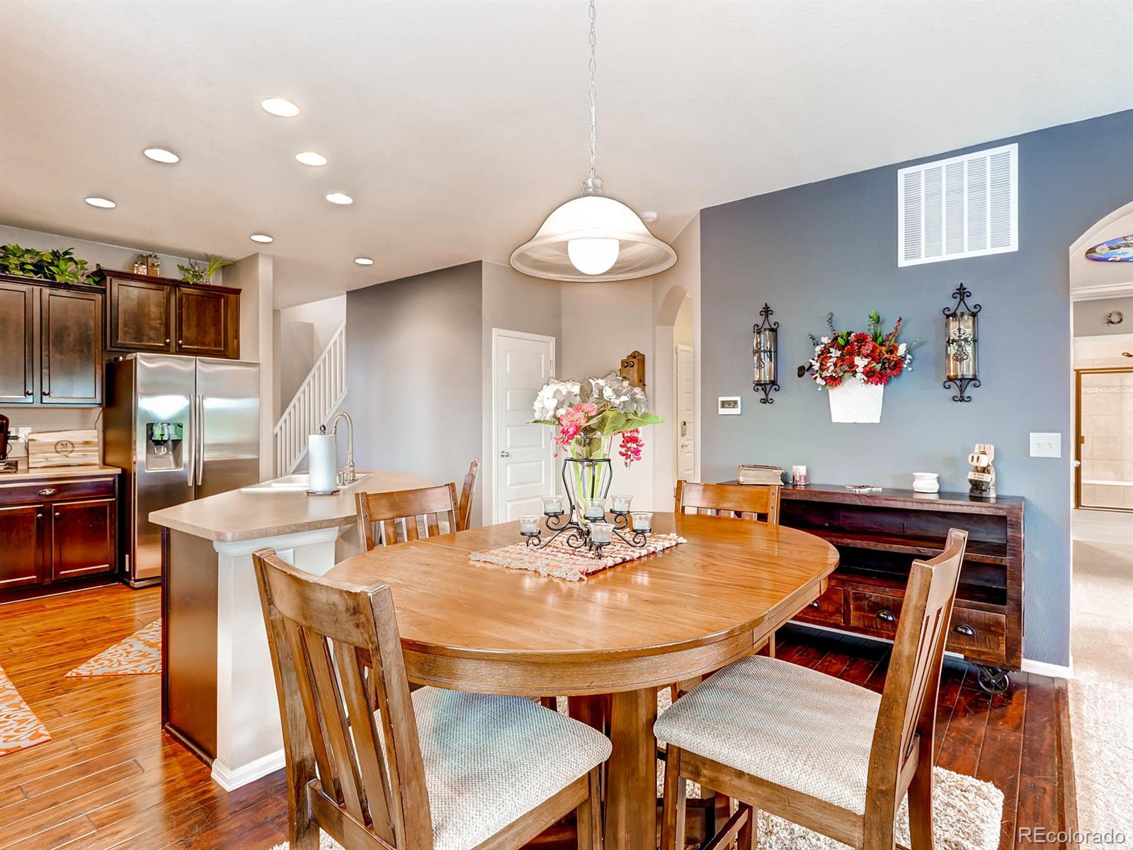4500 Bramble Road Frederick, CO 80504 - Photo 5 of 25 a view of a dining room with furniture