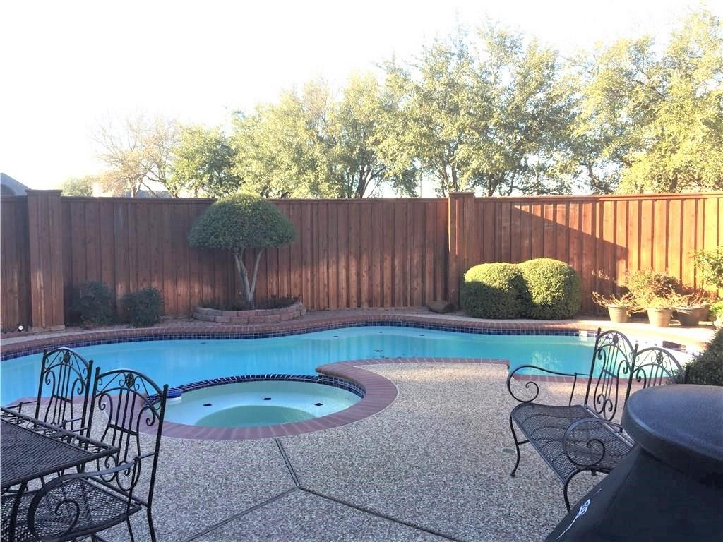 4309 Mead Drive Plano, TX 75024 - Photo 24 of 25 a backyard with table and chairs with wooden fence