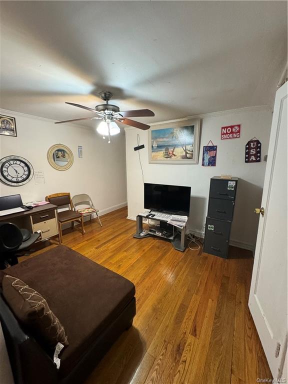 a room with furniture and a flat screen tv