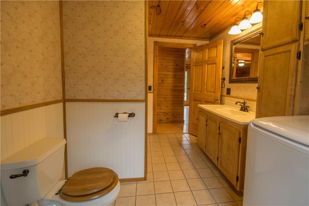 1846 Mattmiscontis Road Lincoln, ME 04457 - Photo 11 of 22 Laundry room in bathroom