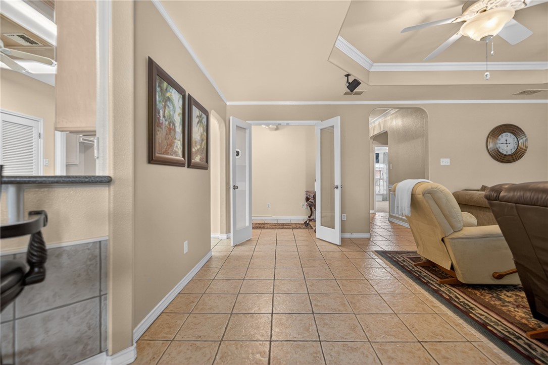 15969 Punta Espada Loop Corpus Christi, TX 78418 - Photo 7 of 40 Double door entry to the office/flex room.