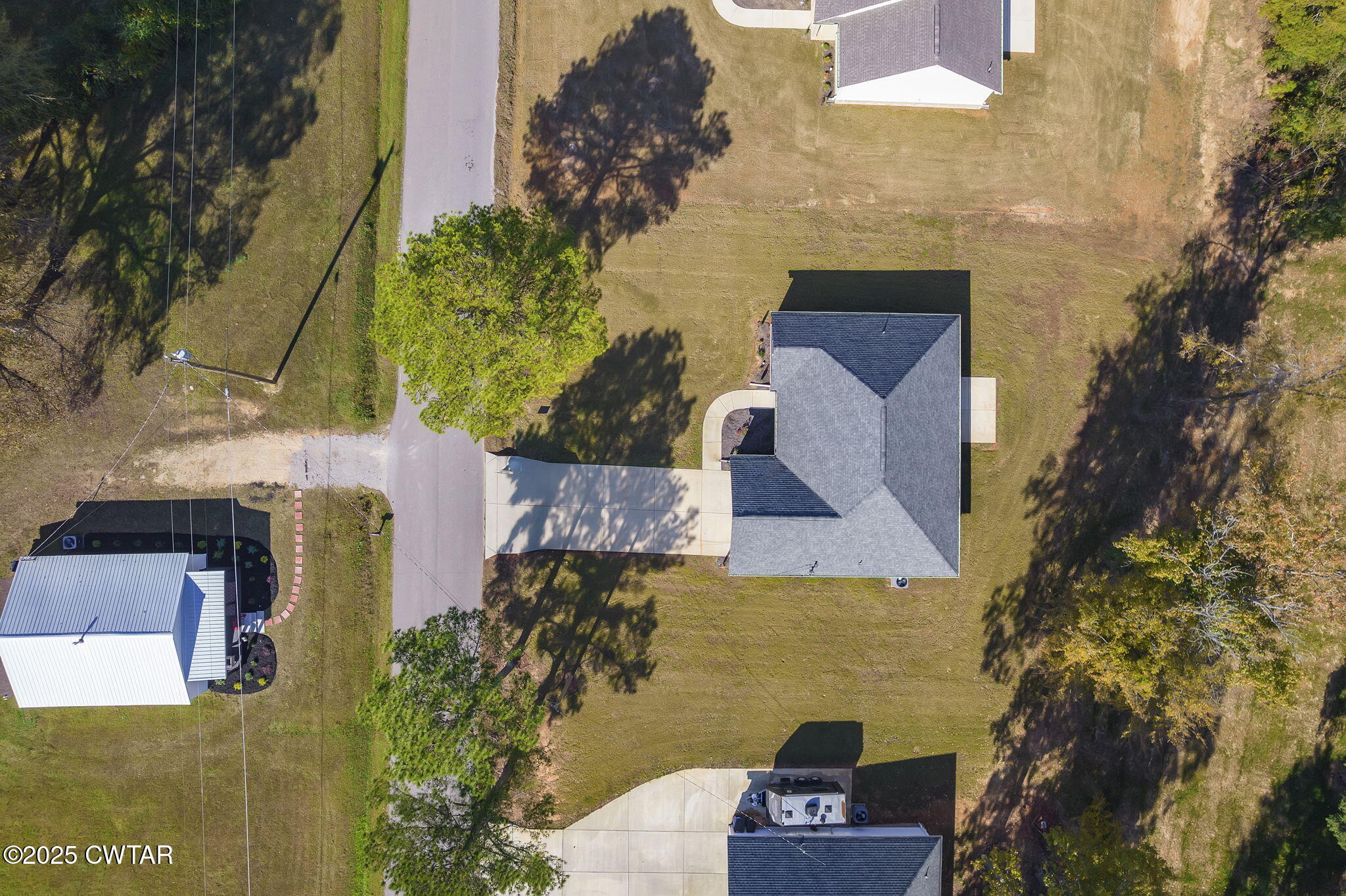448 Old Jackson Road Henderson, TN 38340 - Photo 26 of 32 aerial view of a house with a yard