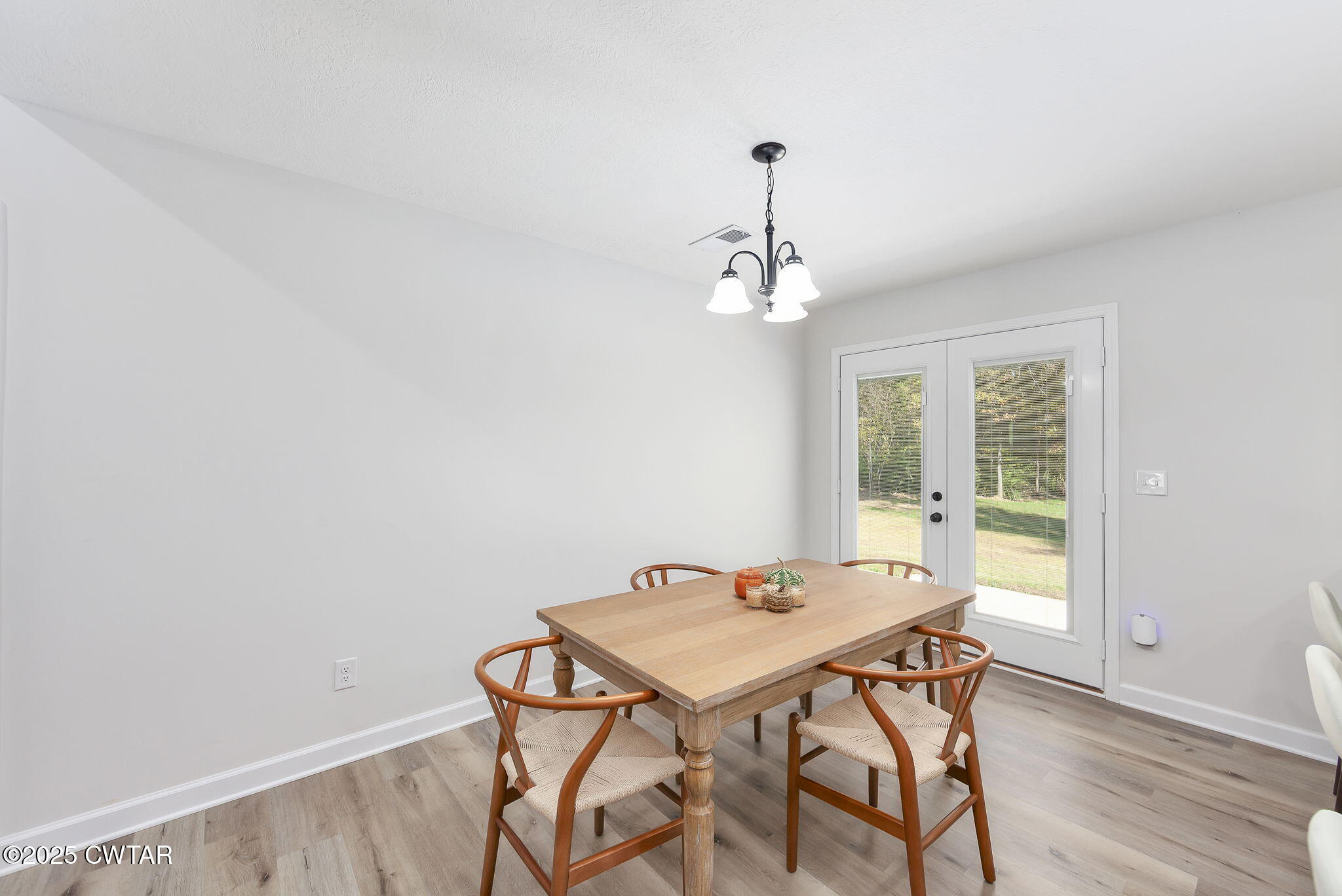 448 Old Jackson Road Henderson, TN 38340 - Photo 6 of 32 a view of a dining room with furniture and wooden floor