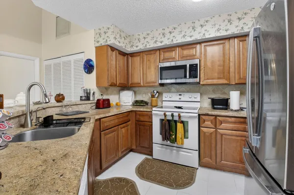 $397,500 | 4790 Brighton Lakes Boulevard, Boynton Beach, FL 33436