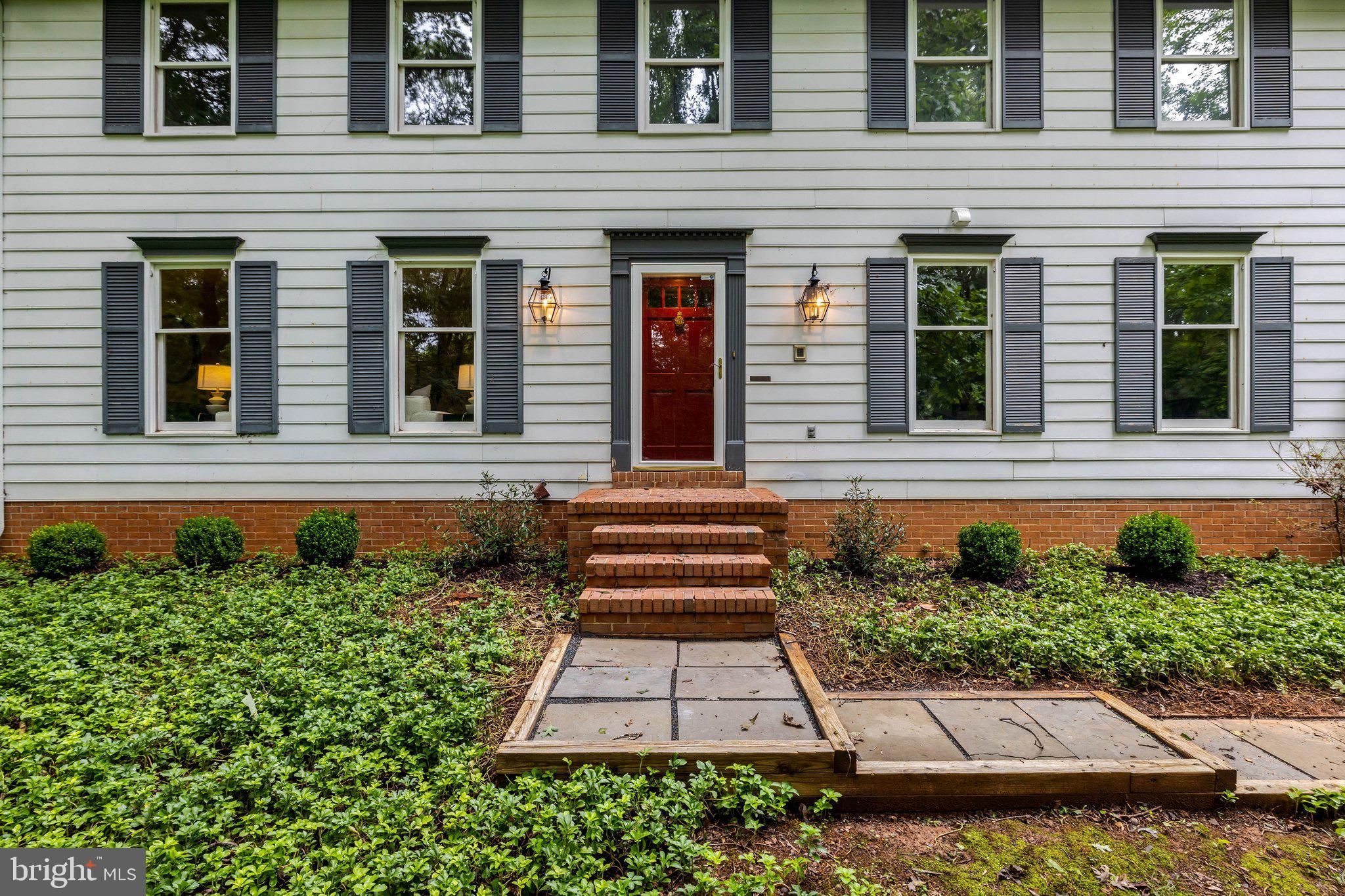 1132 Springvale Road Great Falls, VA 22066 - Photo 76 of 81 Charming entrance with lush greenery.