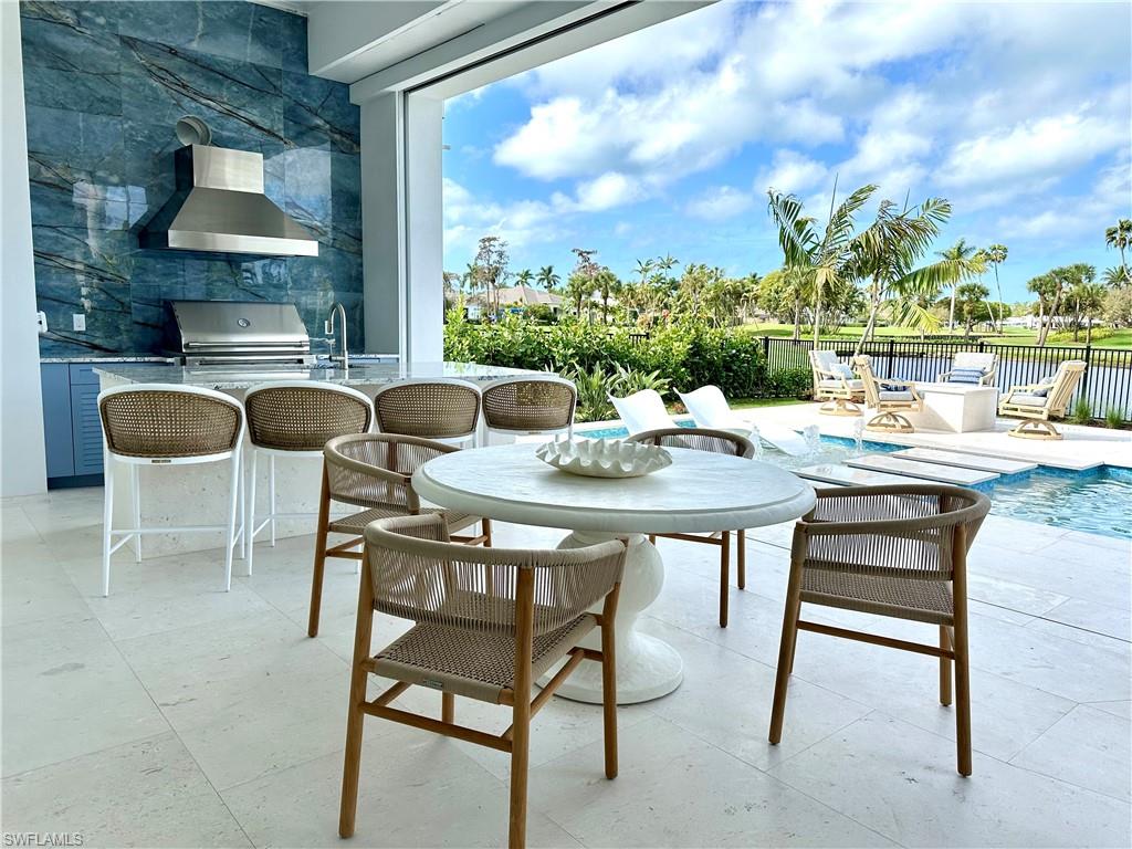 809 Wedge Drive Naples, FL 34103 - Photo 20 of 32 Indoor-Outdoor living, outdoor chef’s kitchen