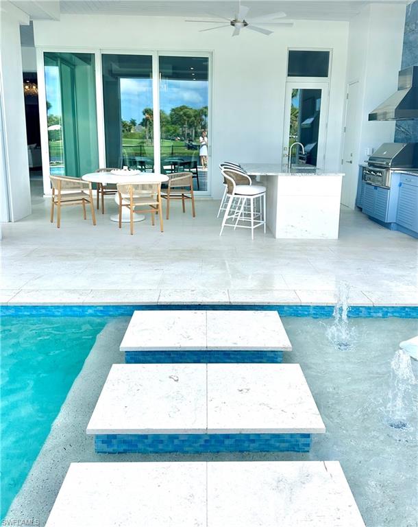 809 Wedge Drive Naples, FL 34103 - Photo 21 of 32 Outdoor chef’s kitchen