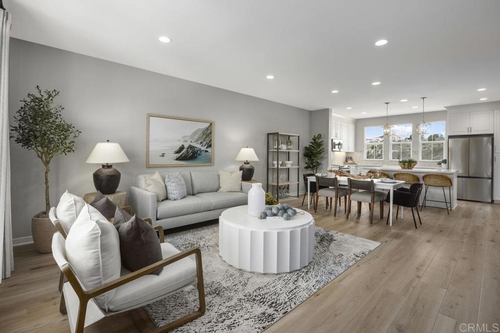 a living room with furniture and a table