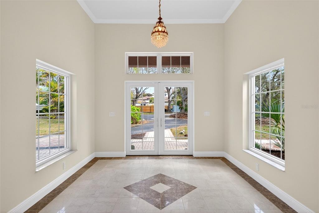 7108 Midnight Pass Road Sarasota, FL 34242 - Photo 9 of 83 a view of an empty room with a window