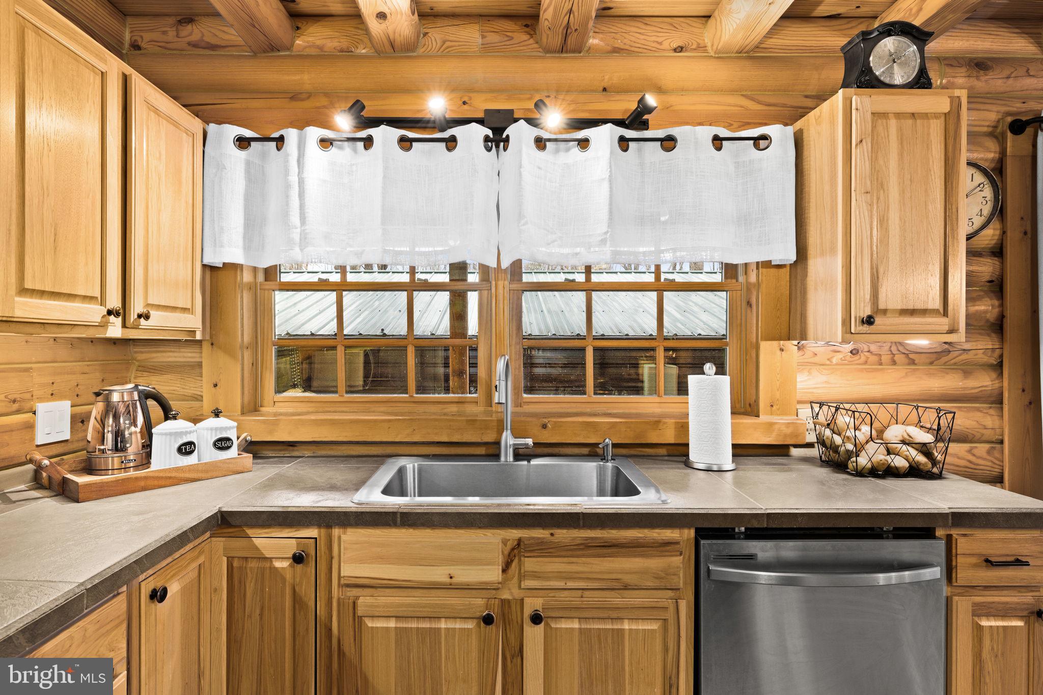 17 Fox Run Bumpass, VA 23024 - Photo 16 of 47 a kitchen with a sink and a large window