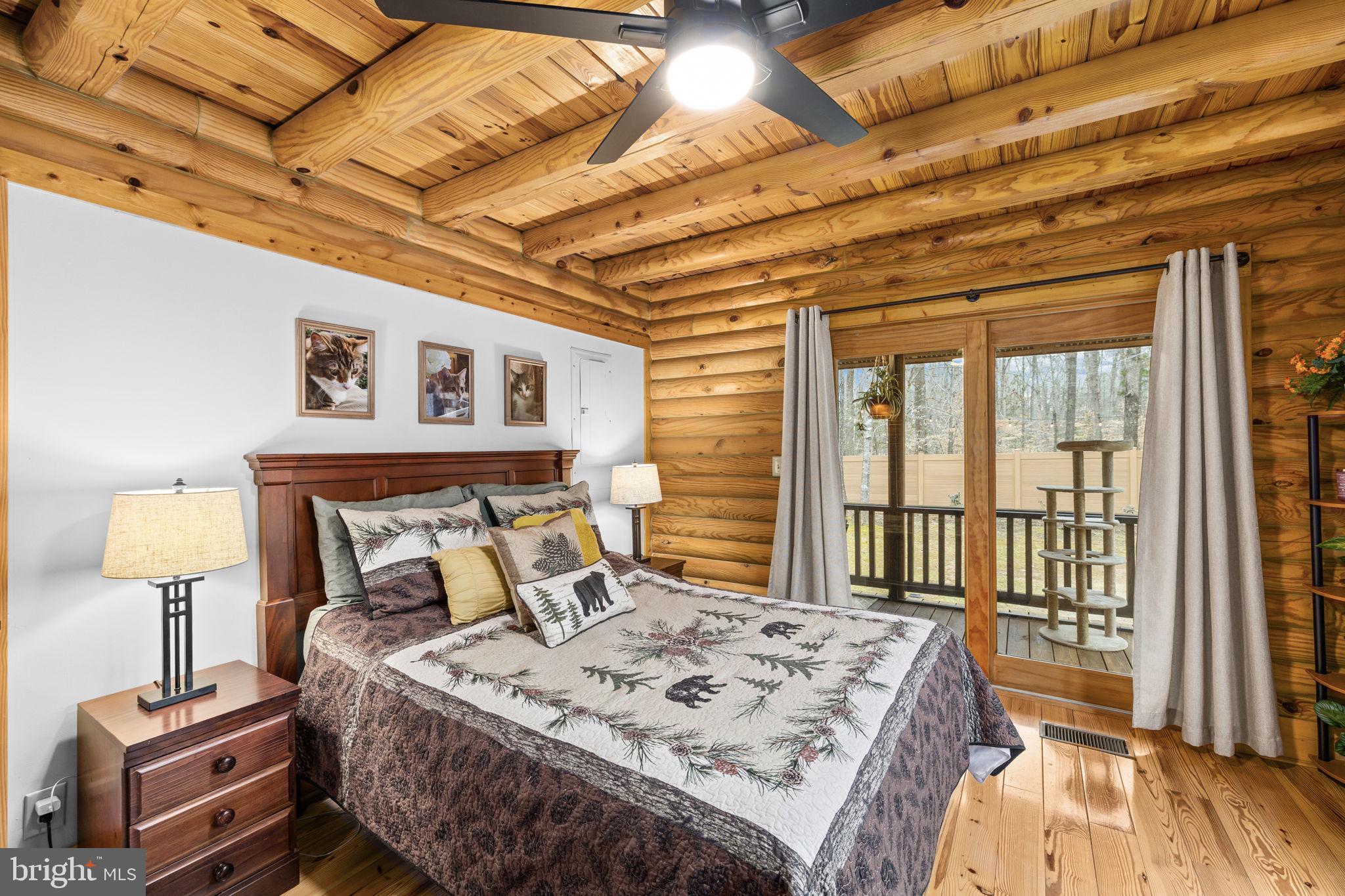 17 Fox Run Bumpass, VA 23024 - Photo 24 of 47 a bed sitting in a bedroom next to a window
