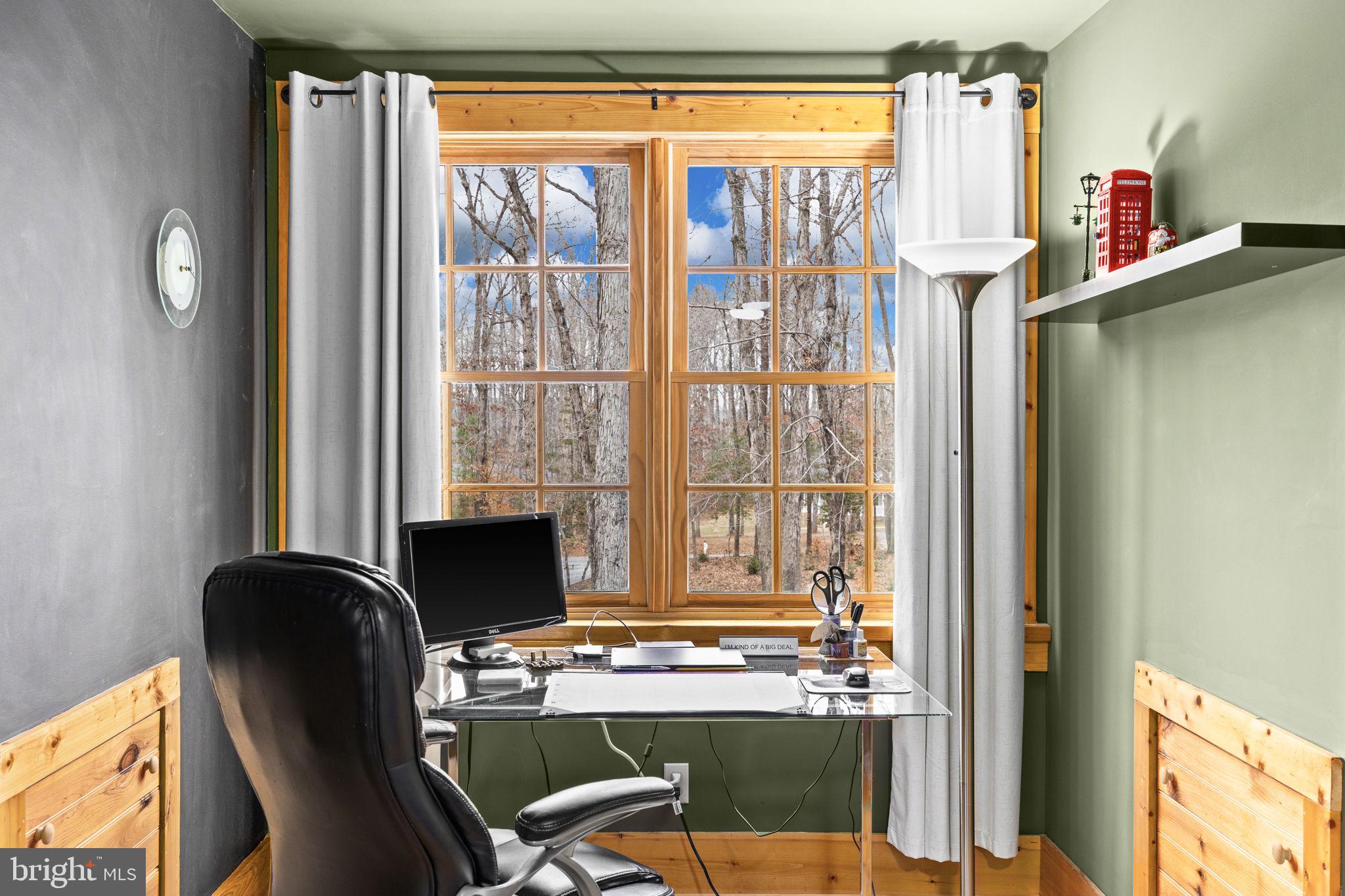 17 Fox Run Bumpass, VA 23024 - Photo 28 of 47 a view of a workspace with furniture and a window