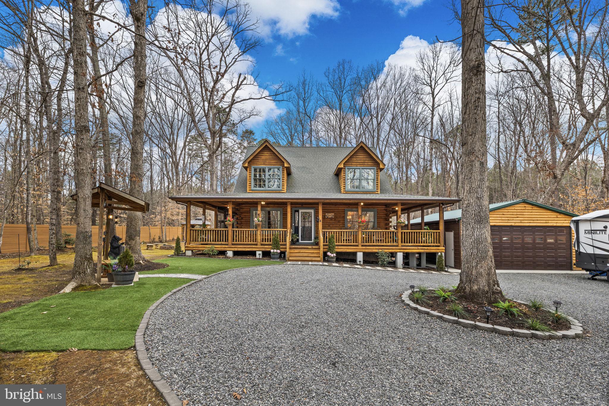 17 Fox Run Bumpass, VA 23024 - Photo 33 of 47 a front view of a house with garden