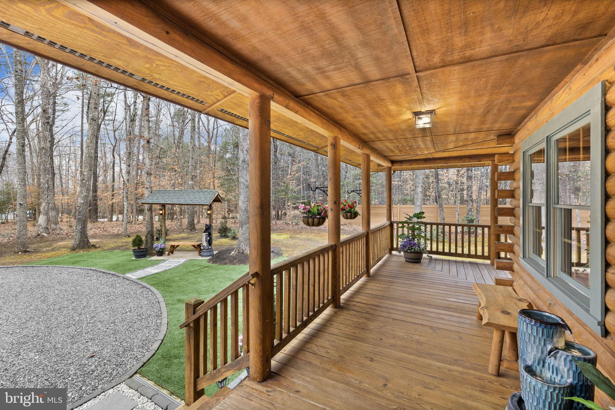 17 Fox Run Bumpass, VA 23024 - Photo 37 of 47 a view of a porch with wooden floor and furniture
