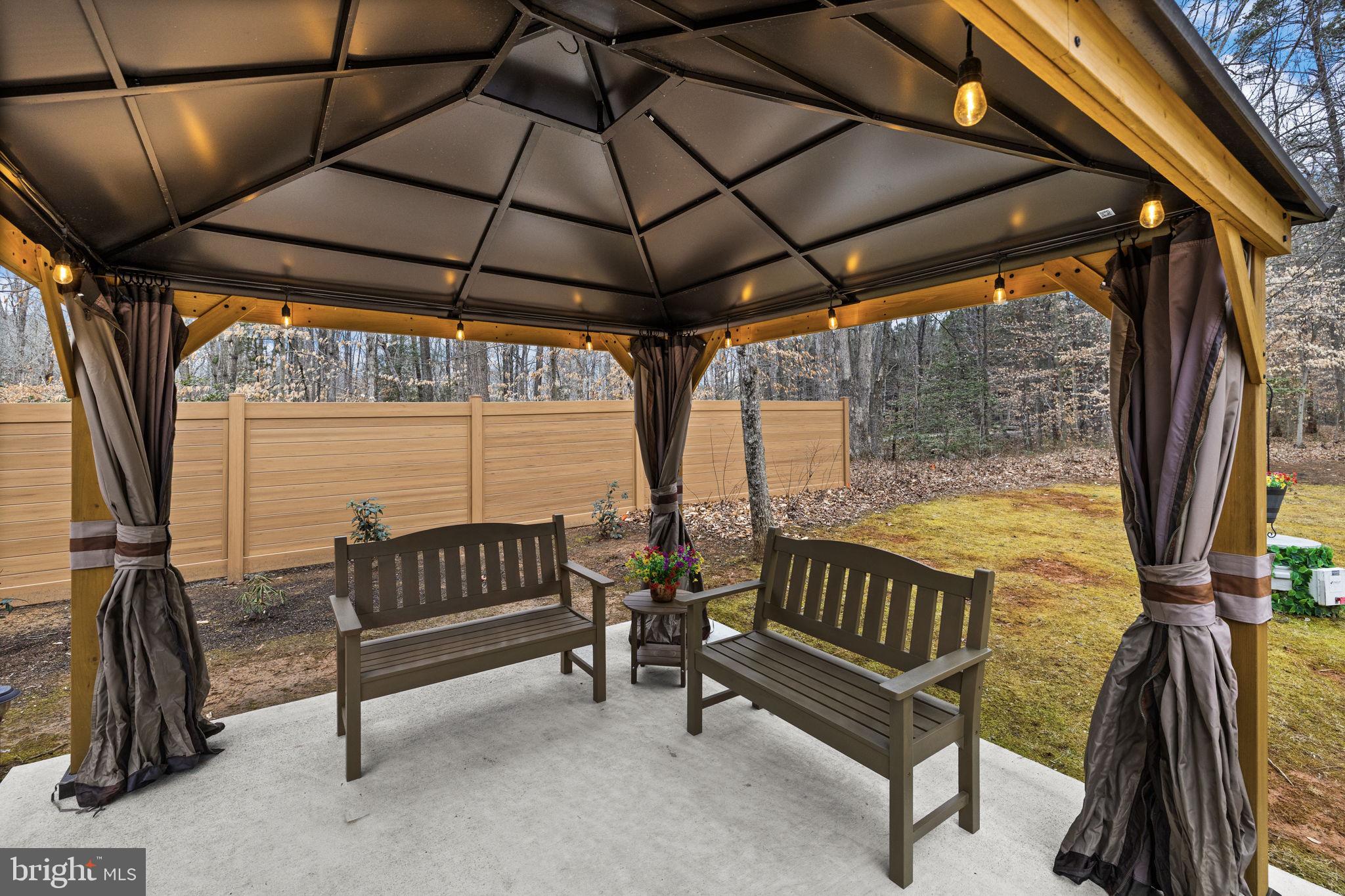 17 Fox Run Bumpass, VA 23024 - Photo 43 of 47 a view of porch with a bench and wooden floor