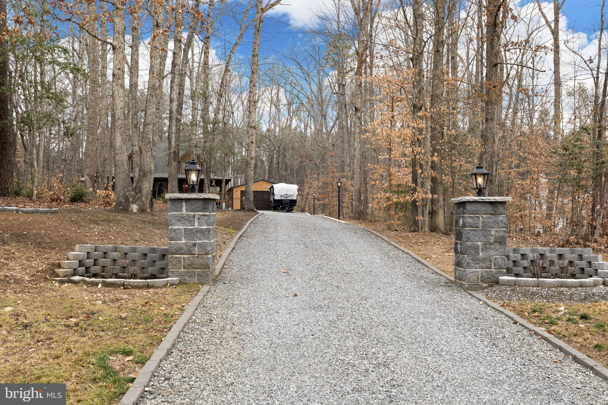 17 Fox Run Bumpass, VA 23024 - Photo 46 of 47 a view of a backyard with large trees