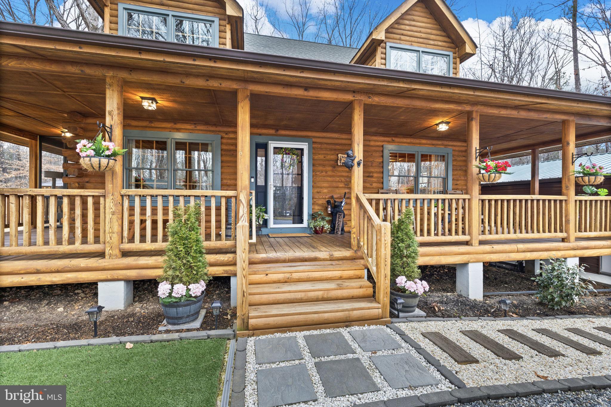17 Fox Run Bumpass, VA 23024 - Photo 5 of 47 a view of a house with a small yard and deck