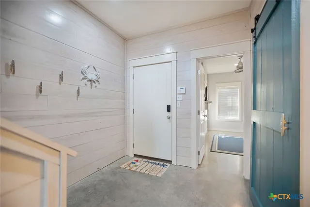 a view of a closet in a room