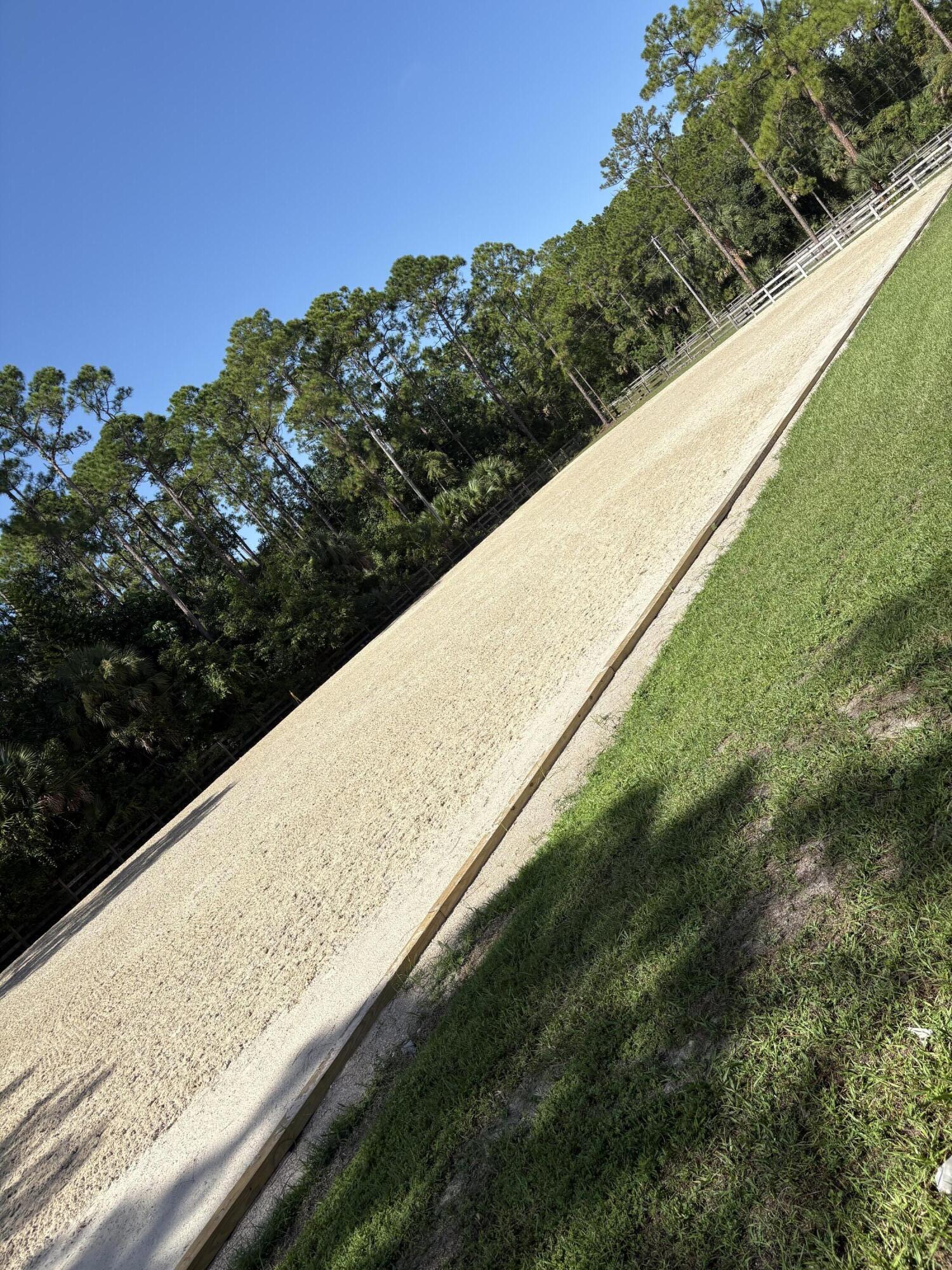 1835 Stallion Drive, Unit STALLS Loxahatchee, FL 33470 - Photo 35 of 35 a view of a yard with an outdoor space